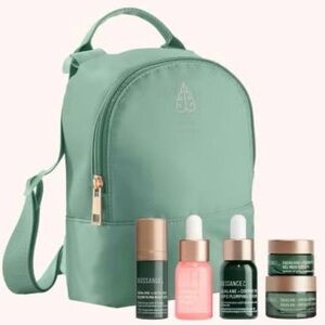 Biossance Skincare Collection with Mint backpack